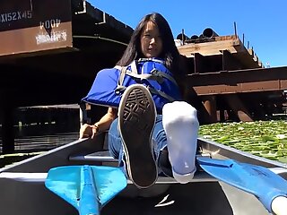 Showing feet in canoe